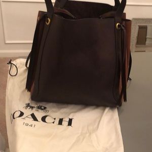 Large Coach bag perfect for fall. Can be used for many things.